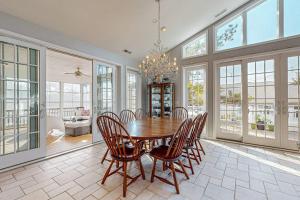 a dining room with a table and chairs at Rehoboth Beach --- 21163 Bayview Rd. in Dewey Beach
