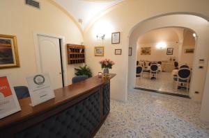 Posezení v ubytování Albergo L'Antico Convitto