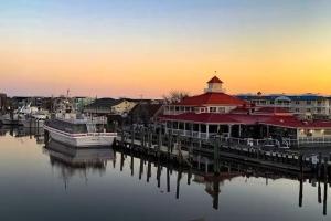 a marina with boats in the water at sunset at Rehoboth Beach --- 18 Sabrina Dr in Lewes +40 photos