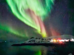 an image of the northern lights in the sky at 4 person holiday home in Rebbenes in Rebbenes