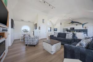 a living room with a couch and a table at 7674 - The Sweet Escape in Avon