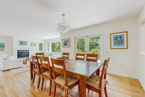 a dining room with a table and chairs at Family Getaway in Oak Bluffs