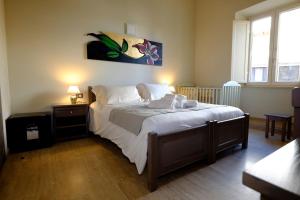 Postel nebo postele na pokoji v ubytování EOS Room and Breakfast