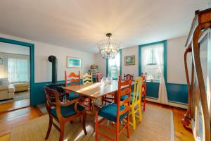 a dining room with a table and chairs at Salty Ridge Station in Orleans