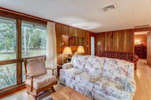 a living room with a couch and a chair at Eastham Escape in North Eastham