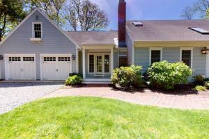 a house with a garage and a driveway at Spinnaker Trail in Orleans