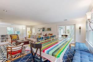 a living room with a large bed in the middle at Mermaid's Rest in Centerville +25 photos