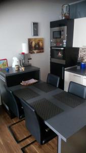 A kitchen or kitchenette at Apartmán Terchová