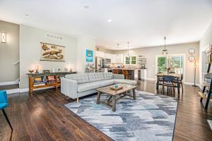 a living room with a couch and a table at Friendly Farms in Lakeside