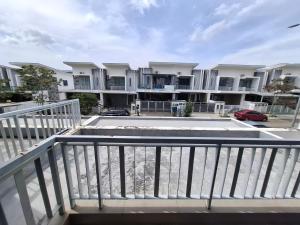 a balcony of a apartment building with a parking lot at D'Aster Sara's Homestay Seremban-Malay Only in Seremban