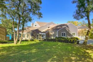 a house with a lawn in front of it at Leisure On The Lake in New Buffalo