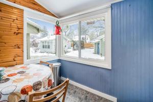 a dining room with a table and a window at South Haven Heaven in South Haven +22 photos