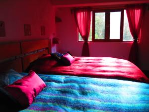 Cama o camas de una habitación en Hotel Molino Machu Picchu Peru