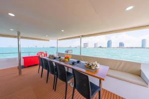 a table on the back of a boat at Ocean Odyssey in Na Jomtien