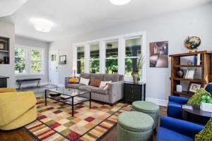 a living room with a couch and a table at Three Oaks Retreat in Three Oaks