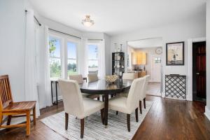 a dining room with a table and chairs at Three Oaks Retreat in Three Oaks +22 photos