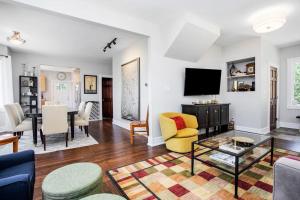 a living room with a couch and a table at Three Oaks Retreat in Three Oaks