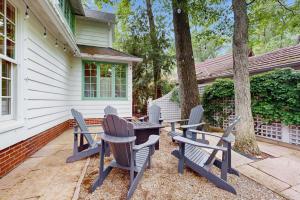 a group of chairs and a table on a patio at Chalet May in Michiana