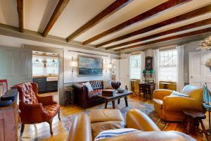 a living room with a couch and a table at The Groggy Anchor in Provincetown