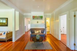 a living room with a couch and a table at East Chop 90 in Oak Bluffs +22 photos