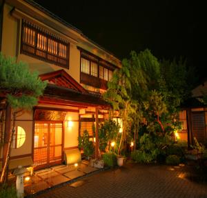 Vonkajšia záhrada v ubytovaní Oiwakeya Ryokan