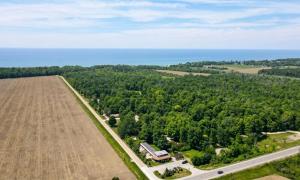 an aerial view of a field and a road at South Shore Suites in Bayfield