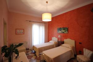 En eller flere senge i et værelse på Tenute Piazza Countryhouse + 35 billeder