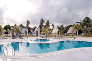 a view of the pool at the resort at Kawaland glamping resort in Telukbakau