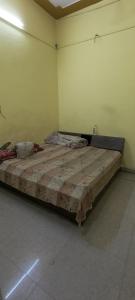 a large bed sitting in a room with at Hotel blue moon in Shāmli