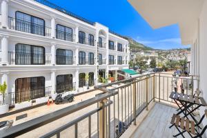 a view from the balcony of a building at Sardunya Andifli Otel in Kaş