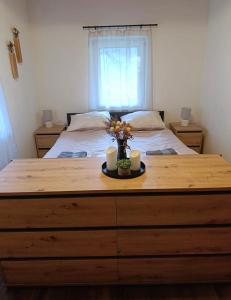 a bedroom with a large bed with two twin beds at Ferienwohnung Storck in Bad Bleiberg