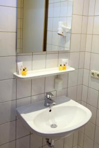 Ein Badezimmer in der Unterkunft VCH Hotel Greifswald