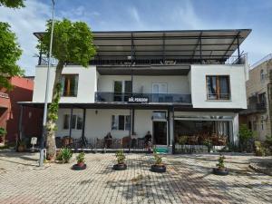 a building with a patio in front of it at GÖL PENSION Adult Only 16 Plus in Egirdir