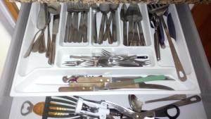 a drawer full of utensils in a refrigerator at Casa Lola in Agaete