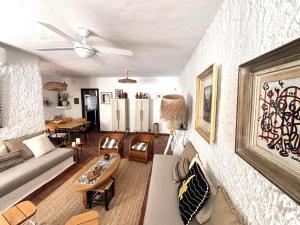 a living room with a couch and a table at Casita Pablo in Agua Amarga
