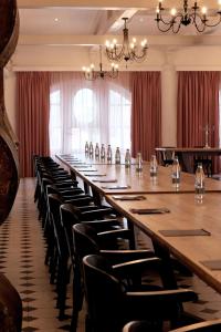 a large conference room with a long table and chairs at Anapea Village in Tkhilistskaro +106 photos