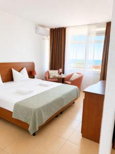 Giường trong phòng chung tại Hotel Sol