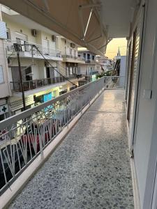 an empty balcony of an apartment building with surfboards at Skyfall with a large balcony and FREE parking in Central Kiato in Kiaton