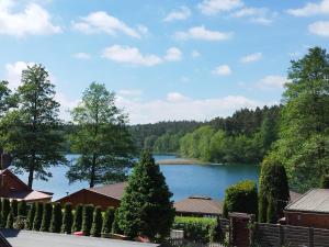 a view of a lake from a house at Betlejem Nad Jeziorem in Gostyczyn