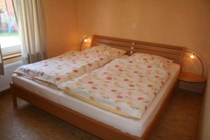 Säng eller sängar i ett rum på Ferienhaus Mara