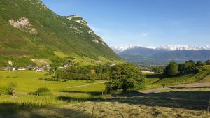 a view of a valley with mountains in the background at Studio au calme - rez de jardin in Chignin