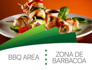 a white plate of food on a table at CARIBBEAN DREAMS Apartment & Villas - OCEAN VIEW - POOL - BBQ in Punta Cana