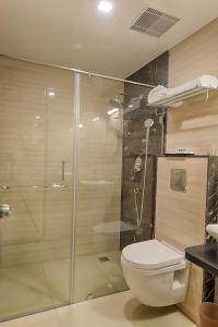 Ένα μπάνιο στο Holiday Residency Coimbatore