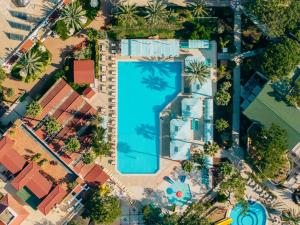 an overhead view of a swimming pool in a city at Pirates Beach Club -Ultra All Inclusive in Tekirova