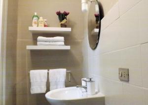A bathroom at Domus Tua