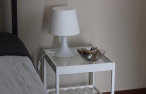 A bed or beds in a room at Domus Tua