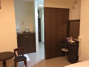 Kuchyň nebo kuchyňský kout v ubytování Ri Yue Hu Pan Resort