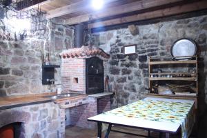 Кухня или кухненски бокс в Casa Entrenidos