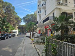 a building on the side of a city street at SunBeach Apartament in Golem