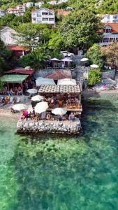 a group of people sitting on a raft in the water at D&N Adriatic Nest in Kotor